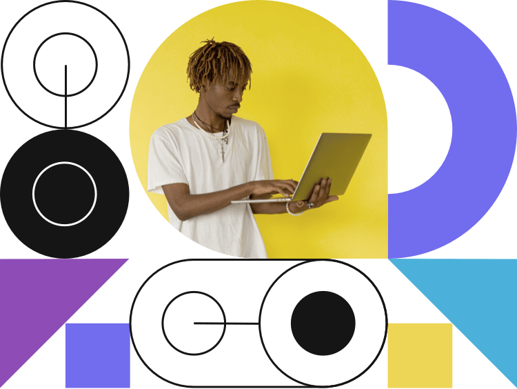 A black man, white t-shirt, with a laptop